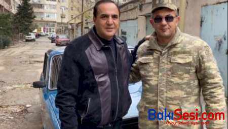 Manaf Ağayev hərbçiyə “07“ bağışladı - Foto