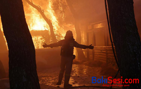 Yunanıstanda yanğına görə minlərlə insan evini tərk edir - Fotolar