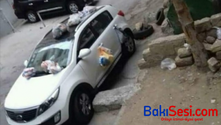 Bakıda avtomobili "zibil qutusu"na çevirdilər - FOTO